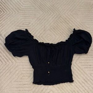 olivaceous Elegant Black Off-Shoulder Top
never worn
size s
